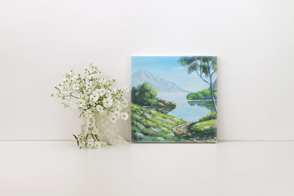 
                  
                    square canvas with white flowers
                  
                