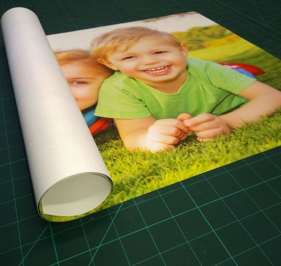
                  
                    photos of children on rolled canvas
                  
                